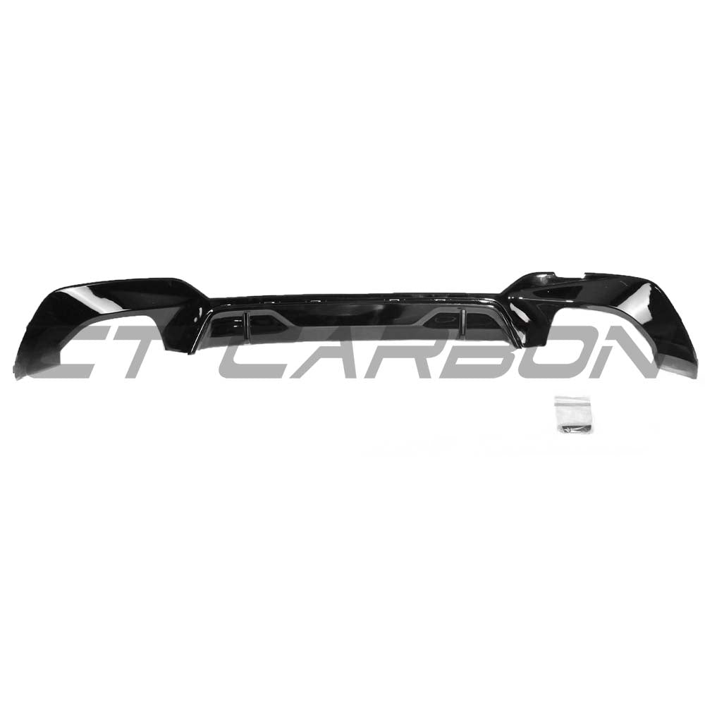 BMW G20 G21 3 Series CT Carbon gloss black diffuser with quad tips, showcasing sleek aerodynamic design on background.