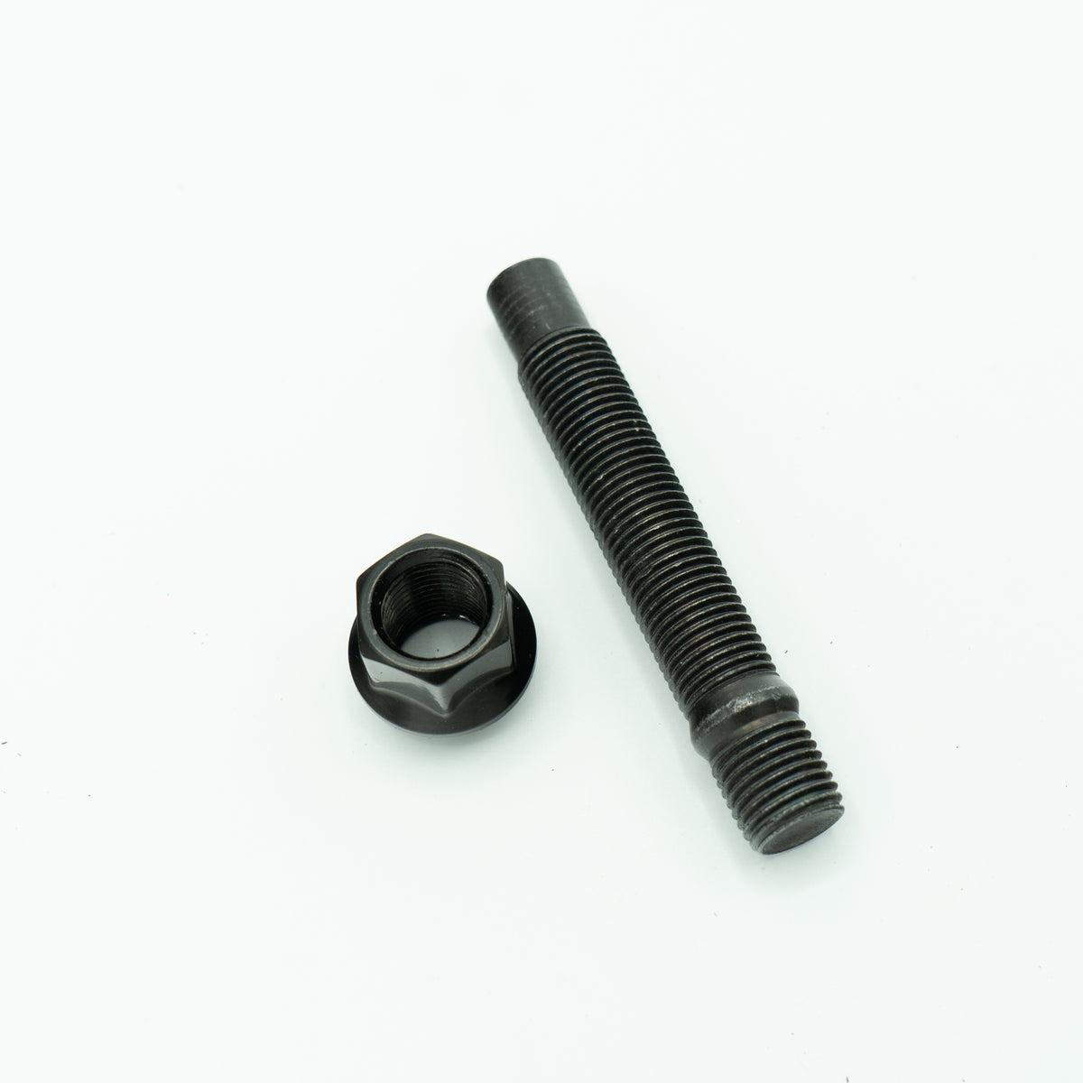 Bimecc BMW wheel stud and nut conversion kit with fitting tools including Loctite, tap, and wire brushes for secure installation.