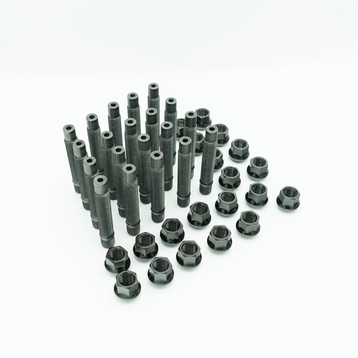 Bimecc BMW wheel stud and nut conversion kit with fitting tools including Loctite, tap, wire brushes, and installation accessories.