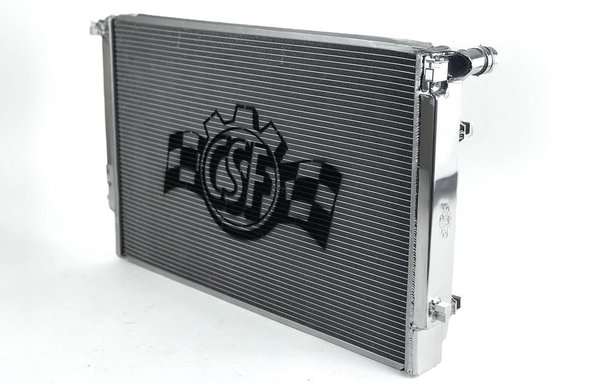CSF VAG MQB all-aluminium triple pass water radiator installed in a VW Golf R MK7 engine bay.