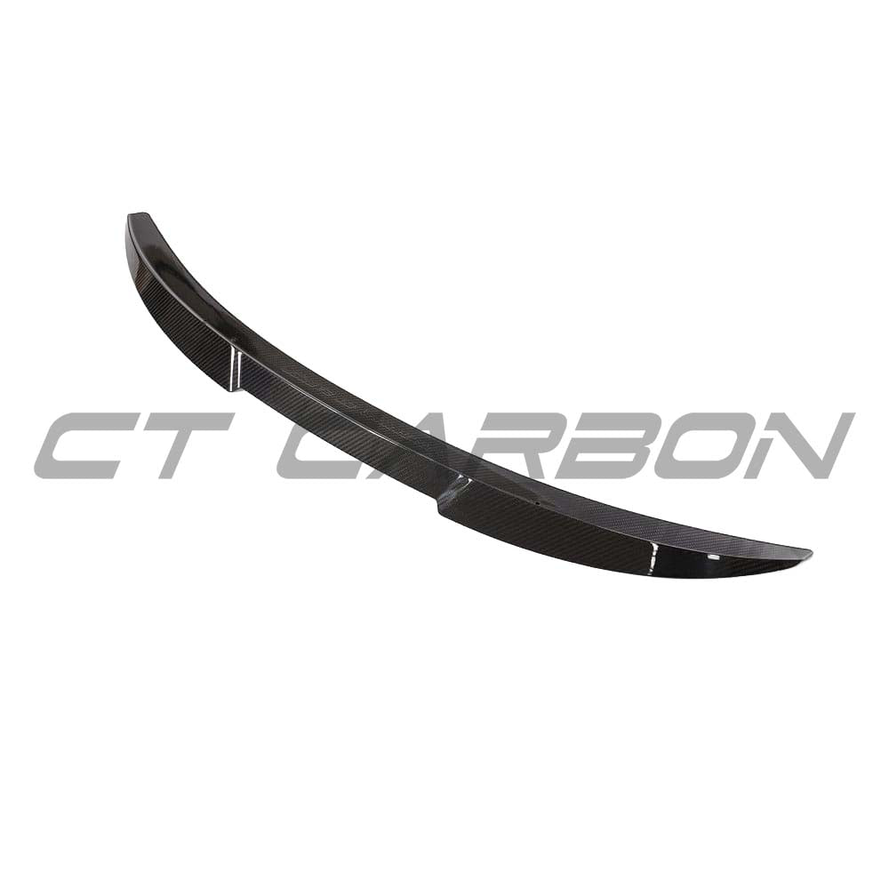BMW G80 M3 full carbon fibre kit by CT Carbon, V10 engine, showing lightweight, high-performance carbon fibre panels on the car.