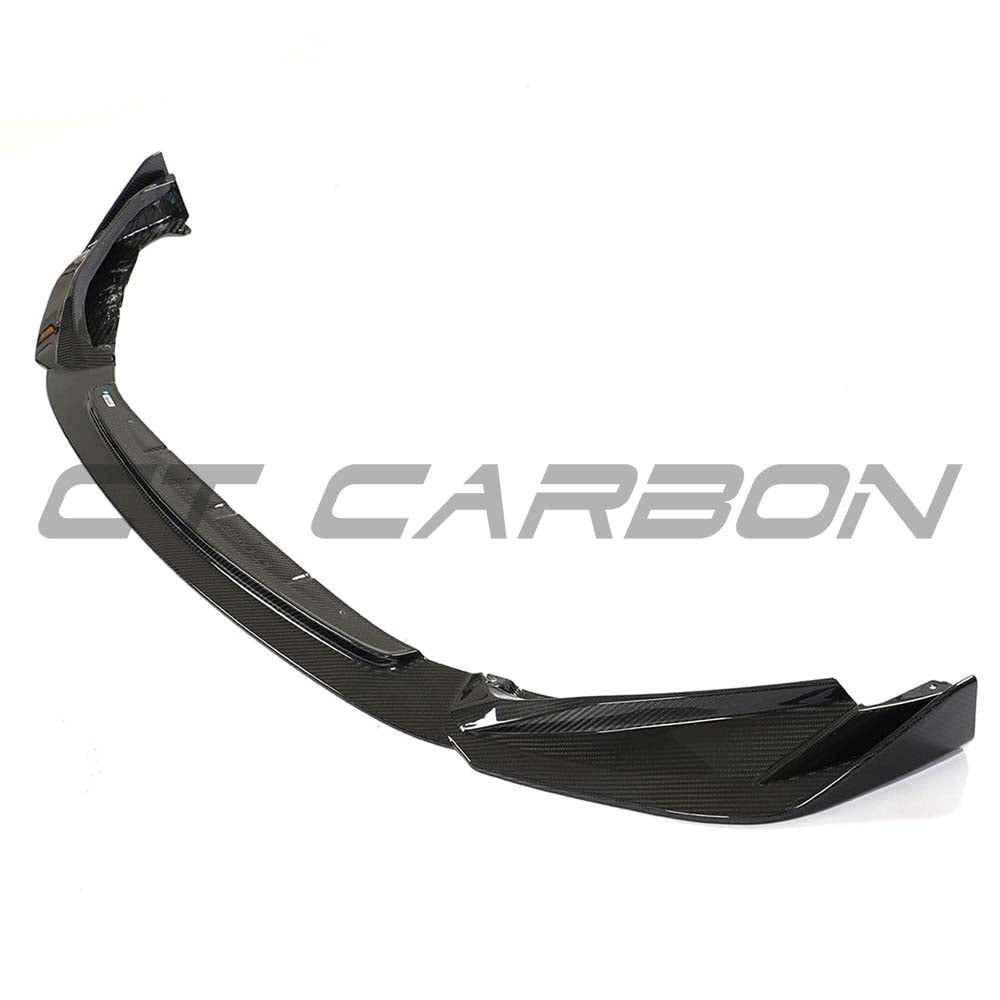 BMW G80 M3 full carbon fibre kit by CT Carbon, including front splitter and aerodynamic components, installed on the car.