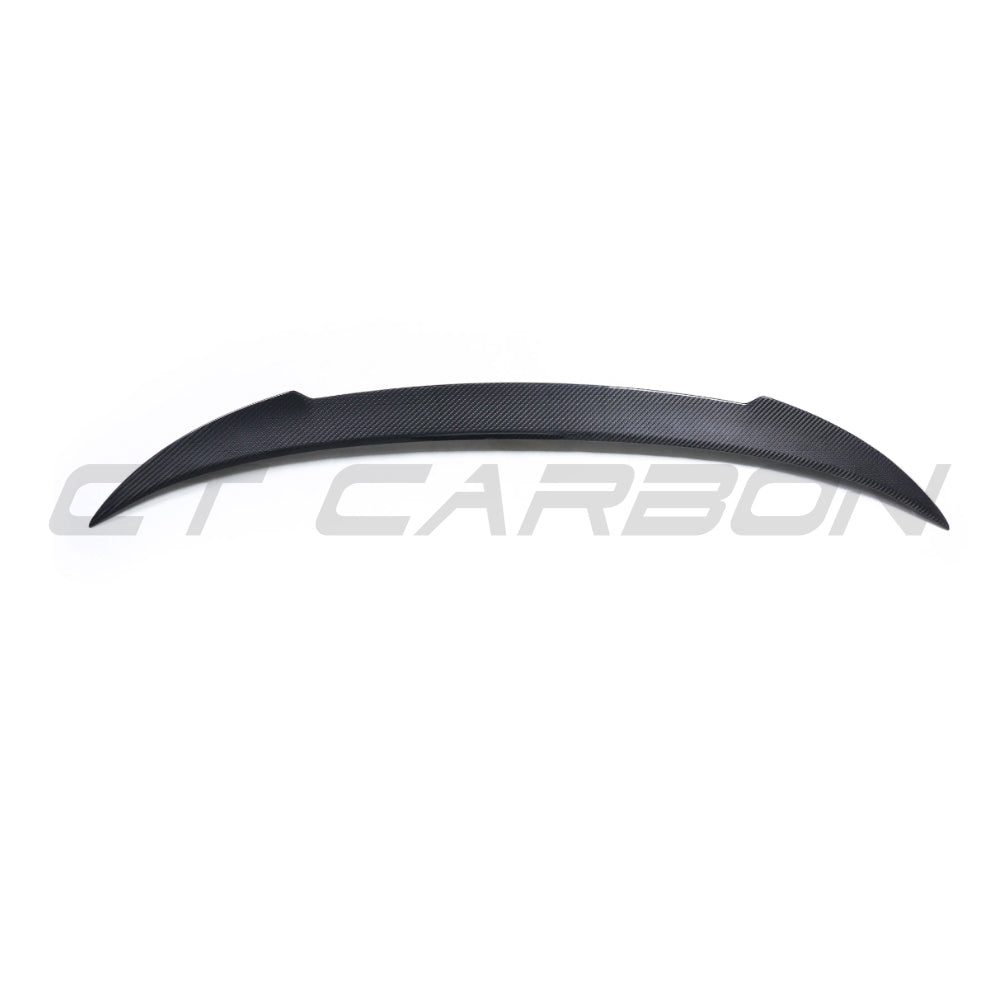 BMW 8 Series M8 G16/F93 carbon fibre spoiler by CT Carbon installed on the rear of the car, showcasing its sleek design and finish.