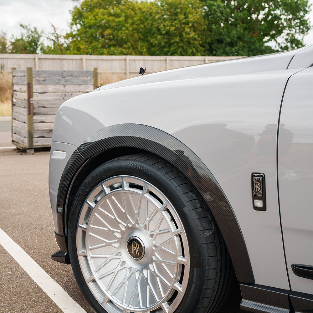 CT Carbon splitters for Rolls Royce Cullinan carbon fibre wheel arch extensions, showcasing sleek, high-performance automotive design.