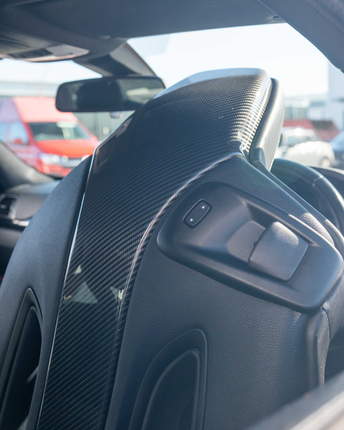 BMW M2C, M3, M4 carbon fibre seat back accessory by CT Carbon, showcasing sleek, lightweight interior upgrade for F87, F80, F82, F83 models.