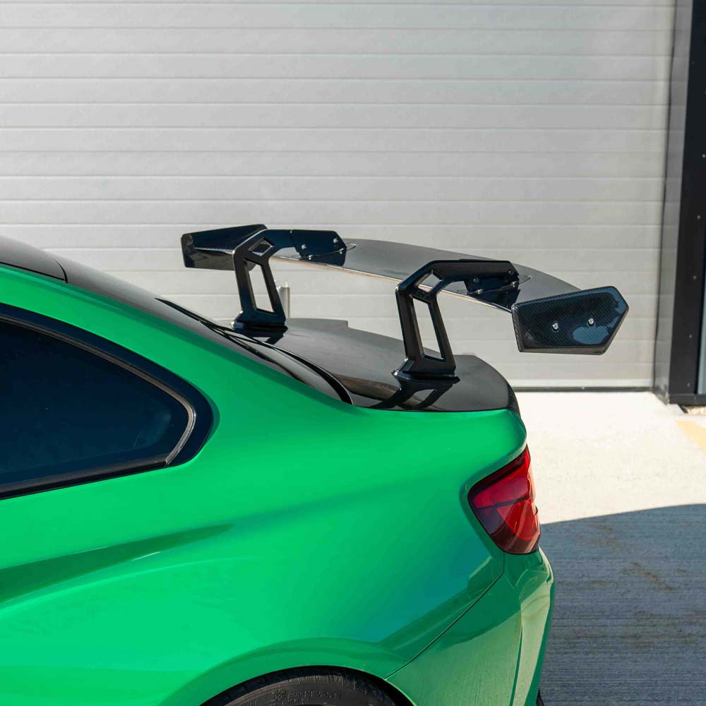 BMW F87 M2 M2C CT Carbon full carbon fiber car kit, including body panels and accents, showcased on a vehicle.