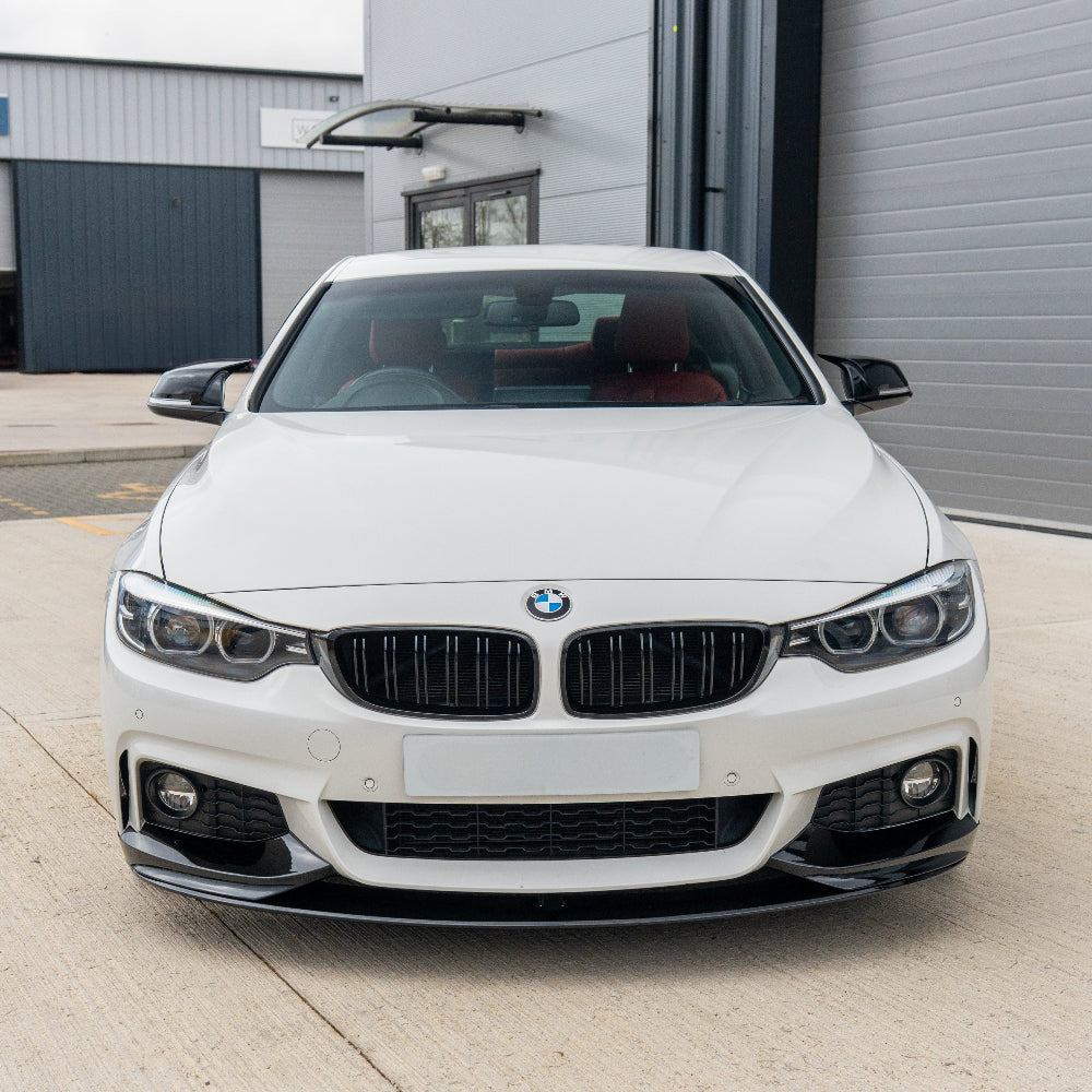 BMW M4 F82/F83 and 4 Series F32/F33/F36 CT Carbon double slat black grille installed on a vehicle.
