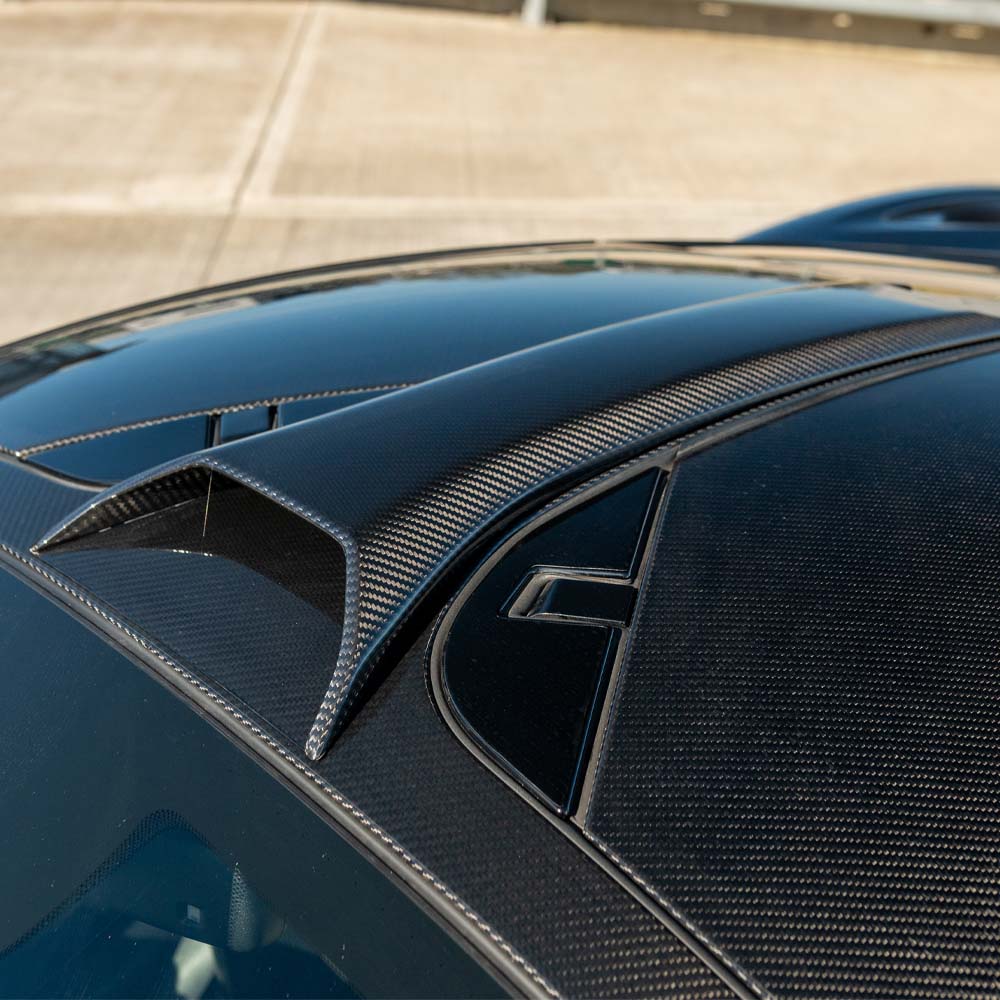CT Carbon McLaren 720S Ultimate Kit installed, showcasing carbon fiber details on the luxury supercar.