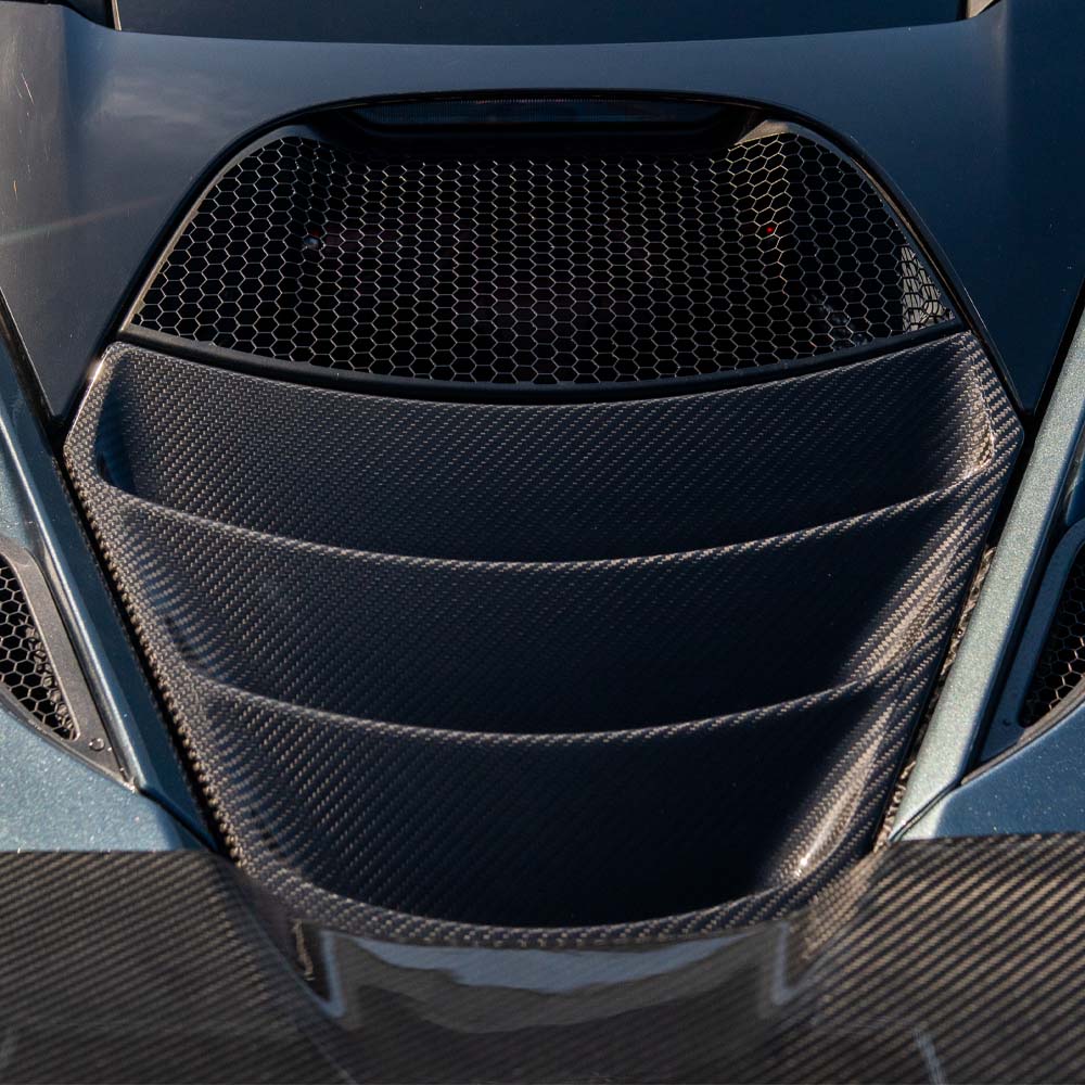 CT Carbon McLaren 720S Ultimate Kit showing detailed carbon fiber components and aerodynamic enhancements on a sports car.