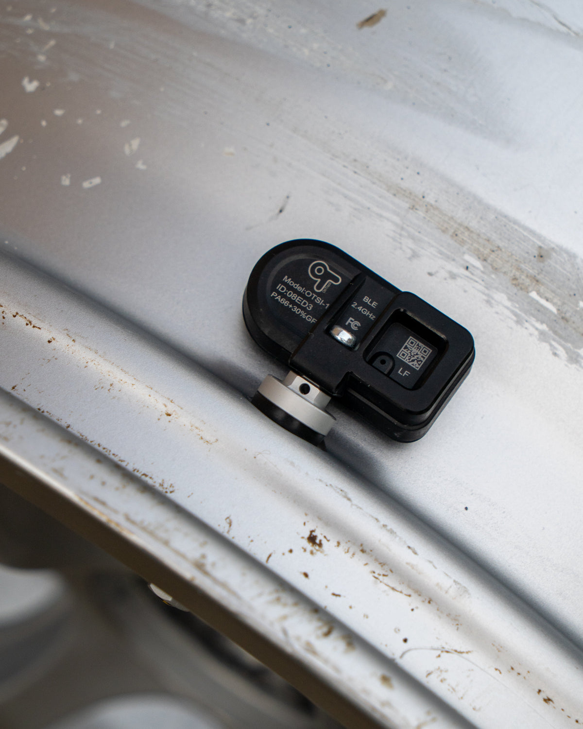 OnTrack Internal TPMS Tyre Pressure Sensors installed in vehicle wheels for monitoring tire pressure and safety.