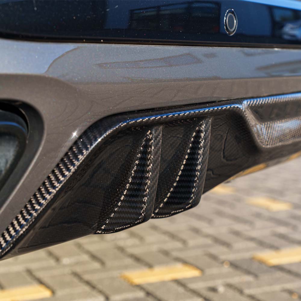 BMW G05 X5 LCI 2023 full carbon fiber ultimate kit by CT Carbon, showcasing detailed carbon fiber components on the vehicle.