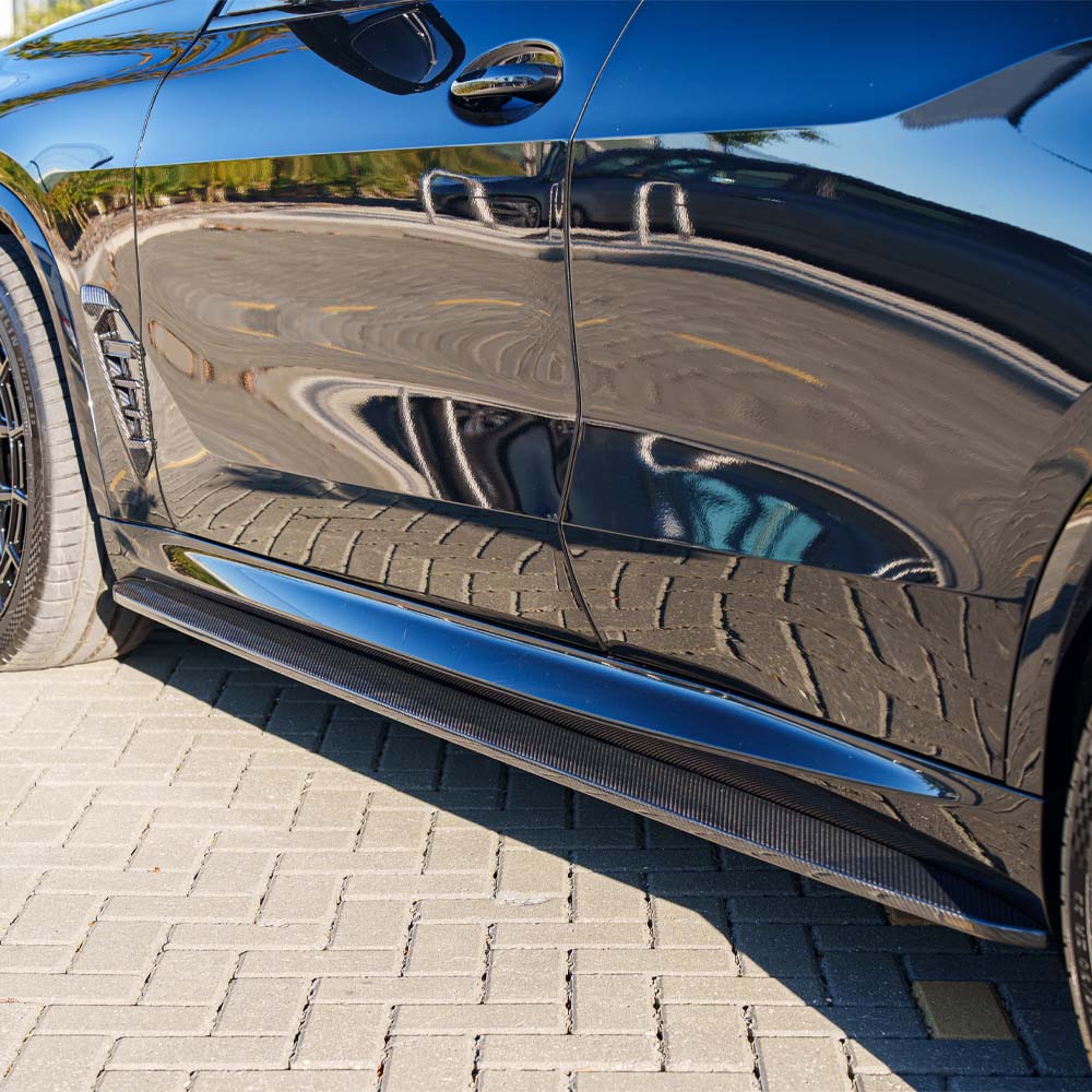 BMW G05 X5 LCI 2023 full carbon fiber ultimate kit by CT Carbon, showing sleek, lightweight carbon fiber components on the vehicle.