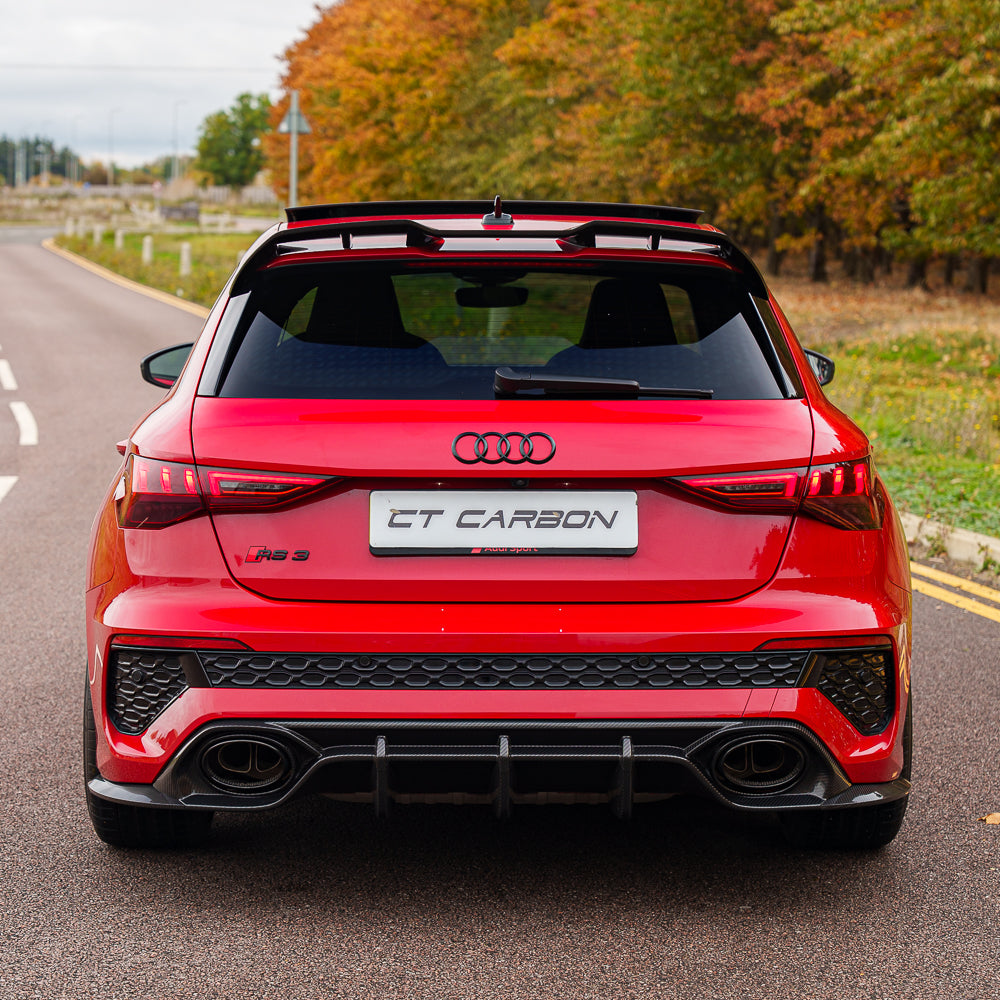 Full car carbon fiber kit for Audi RS3 8Y Sportback 2022-2024 by CT Carbon, shown on a sleek, black Audi RS3 Sportback.