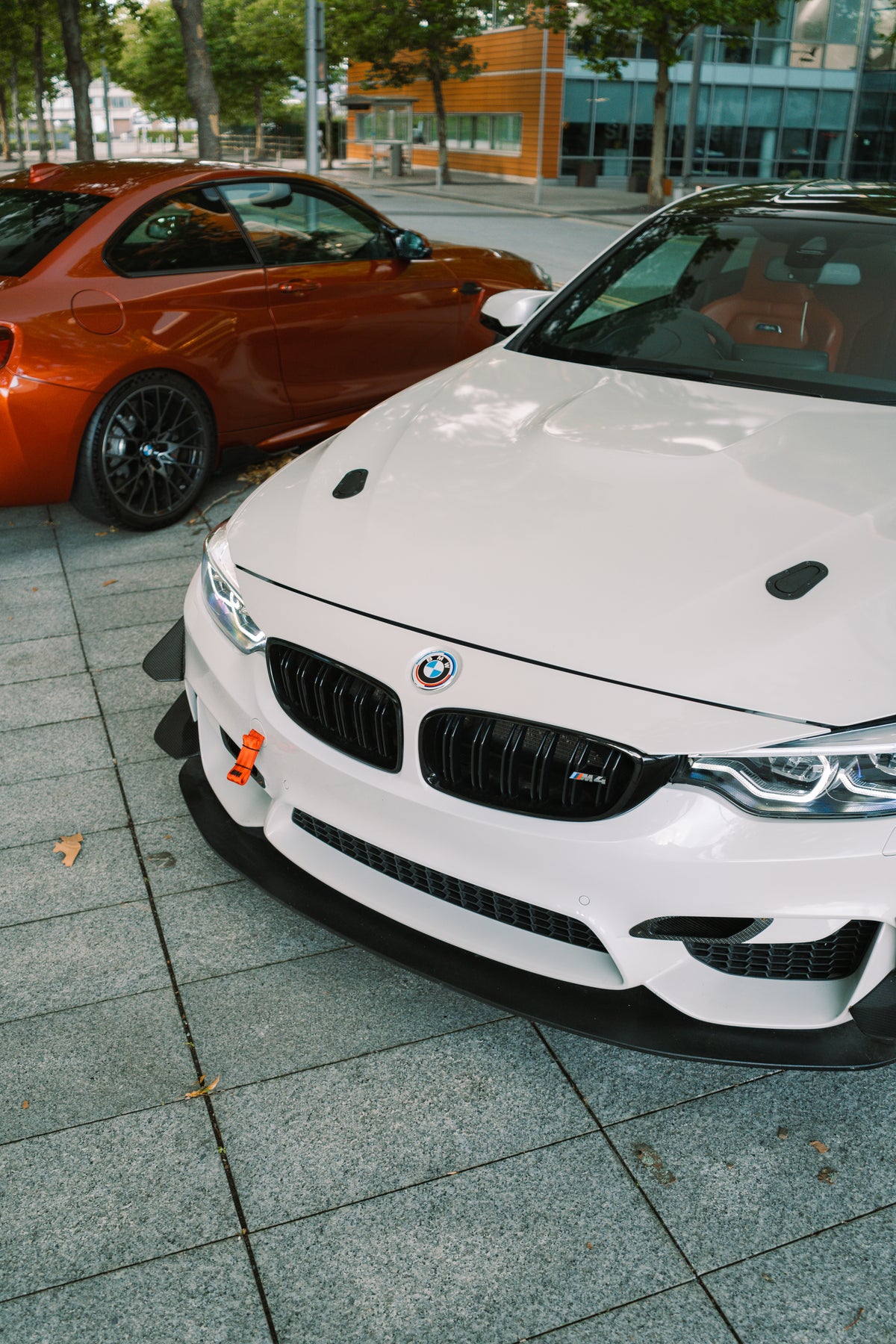 Carbon GT4 side canards for BMW M3 and M4 F80 and F82, front bumper trim, Nineteen72 Performance, mounted on car.