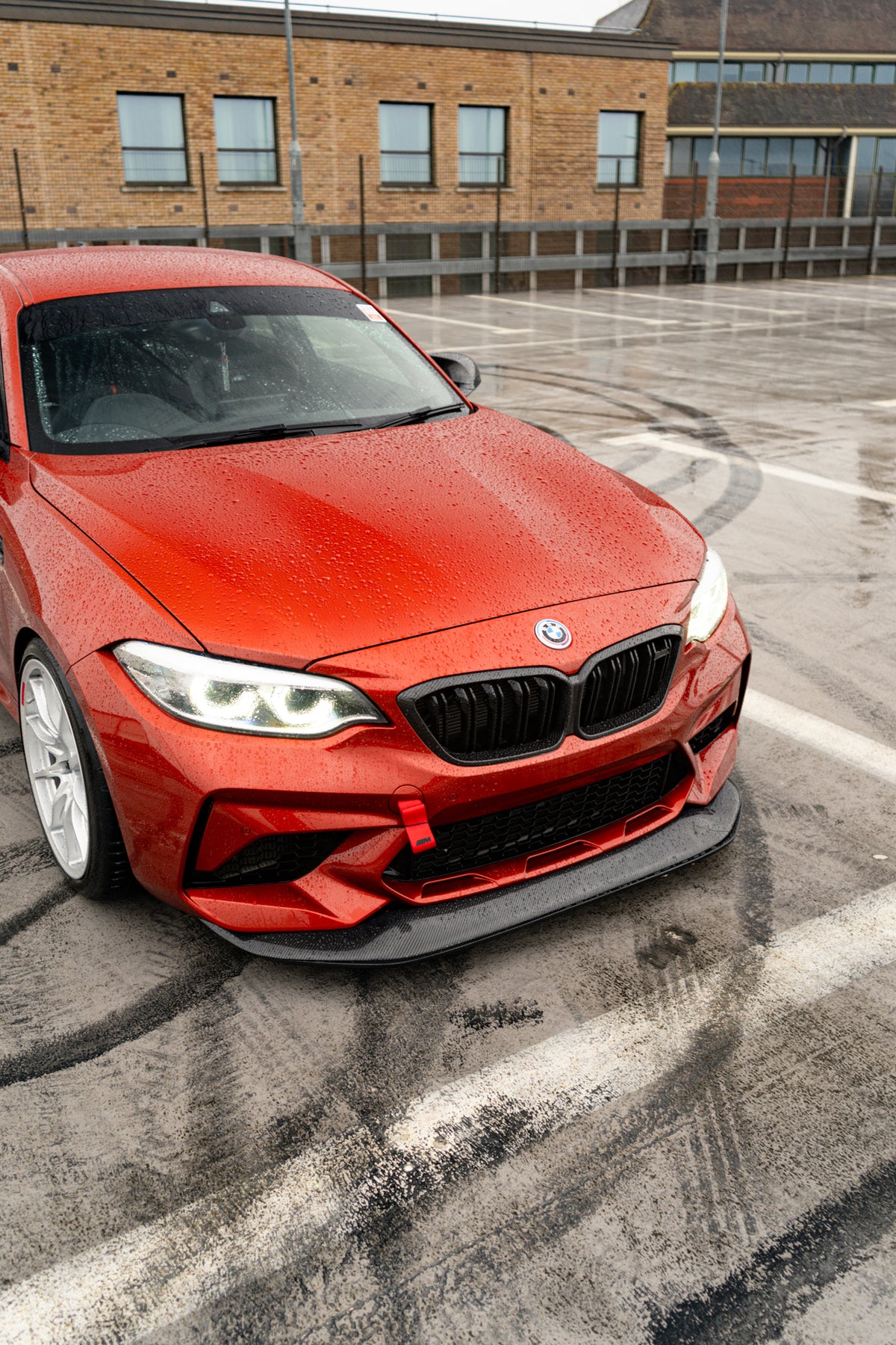 Ridgeline Motorsport F87 M2 Competition carbon fibre GTS front splitter mounted on a BMW M2 Competition.