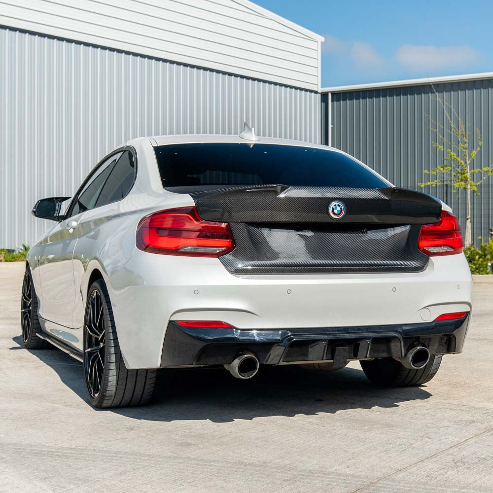 BMW M2 F87 & F22 carbon fibre bootlid by CT Carbon, showcasing lightweight, aerodynamic design with a sleek finish.