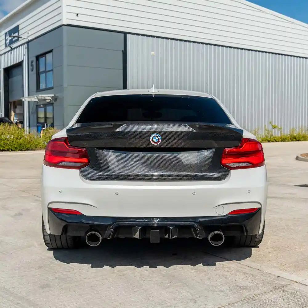 BMW M2 and M2C F87 F22 carbon fibre bootlid by CT Carbon, showing the lightweight, aerodynamic design and glossy finish.