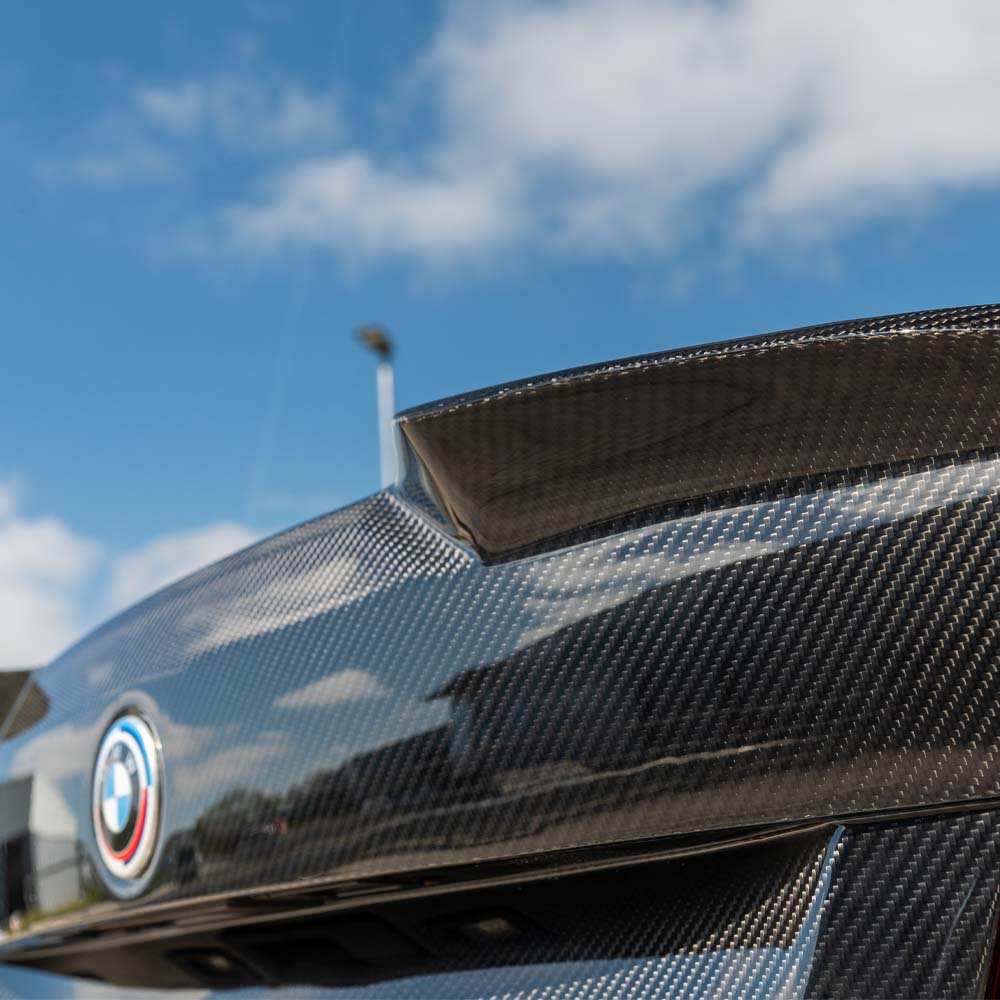 BMW M2 carbon fibre bootlid by CT Carbon, showing sleek, lightweight design on the F87 and F22 2 Series models.