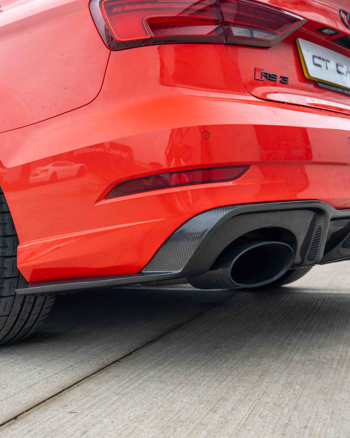 CT Carbon Audi RS3 8V saloon rear carbon diffuser with DTM light, showcasing sleek aerodynamic design and premium finish.