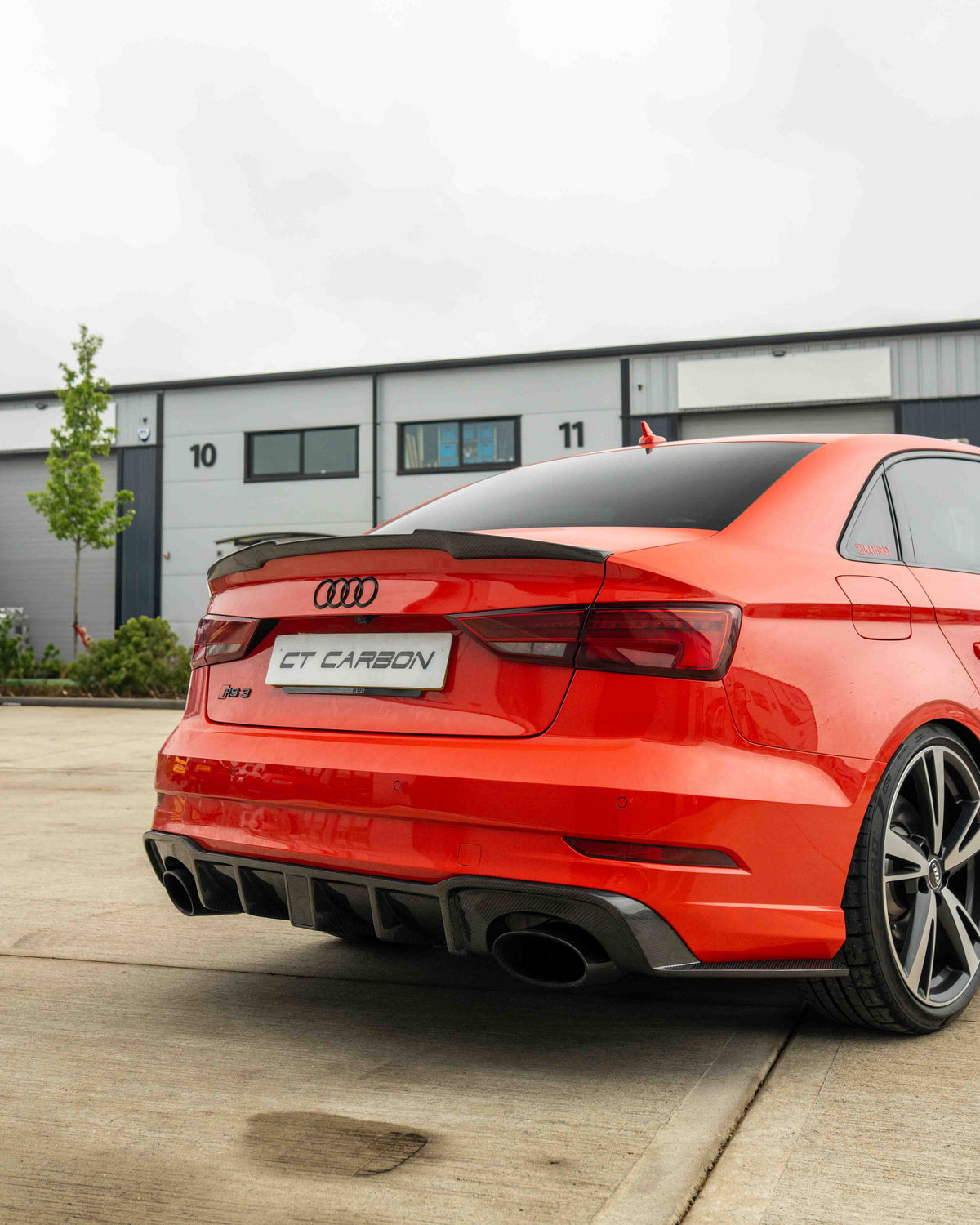 CT Carbon Audi RS3 8V saloon rear carbon diffuser with DTM light, showcasing sleek design and sporty performance features.
