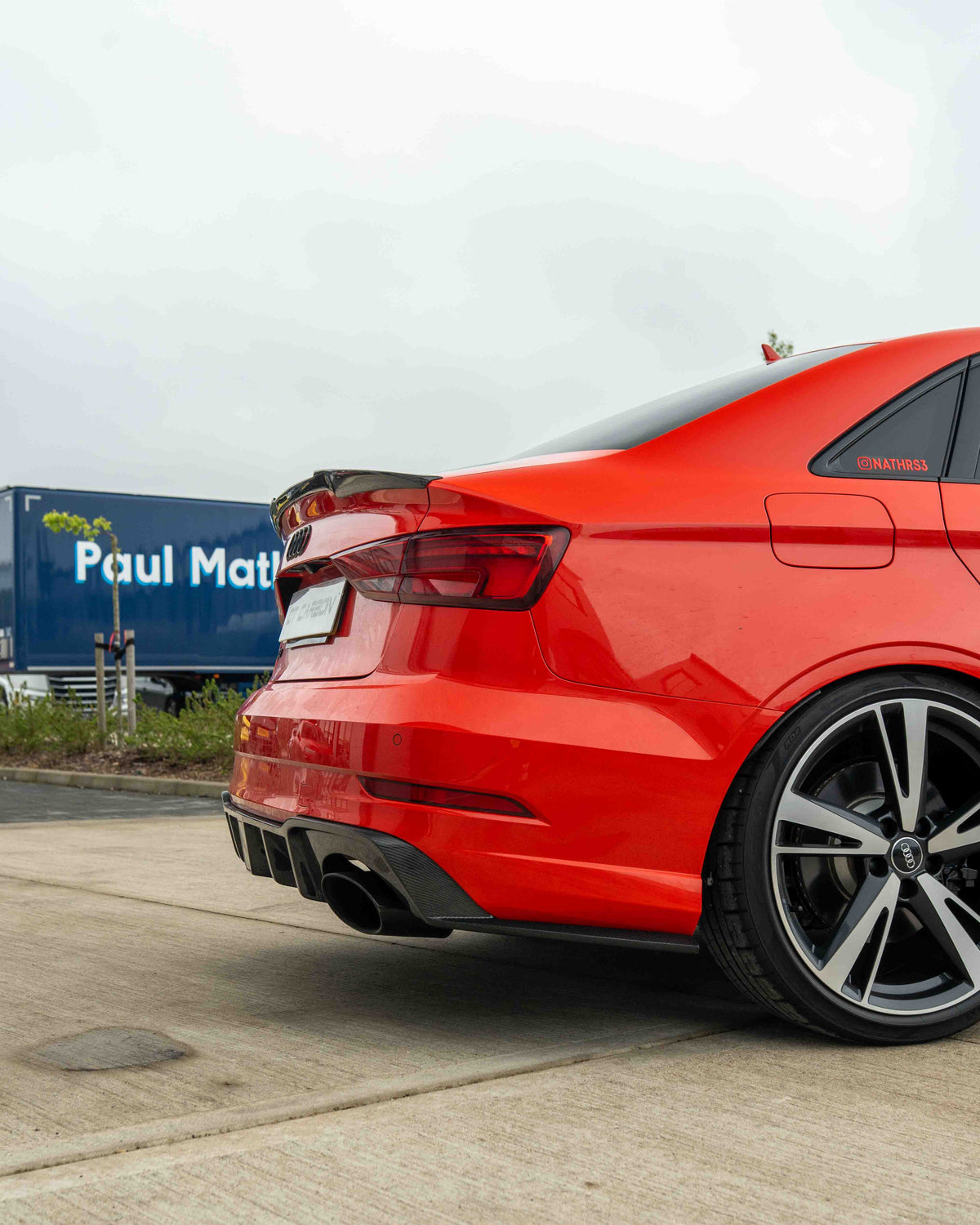 CT Carbon AUDI RS3 8V saloon rear carbon diffuser with DTM light, showcasing sleek aerodynamic design and high-quality carbon finish.