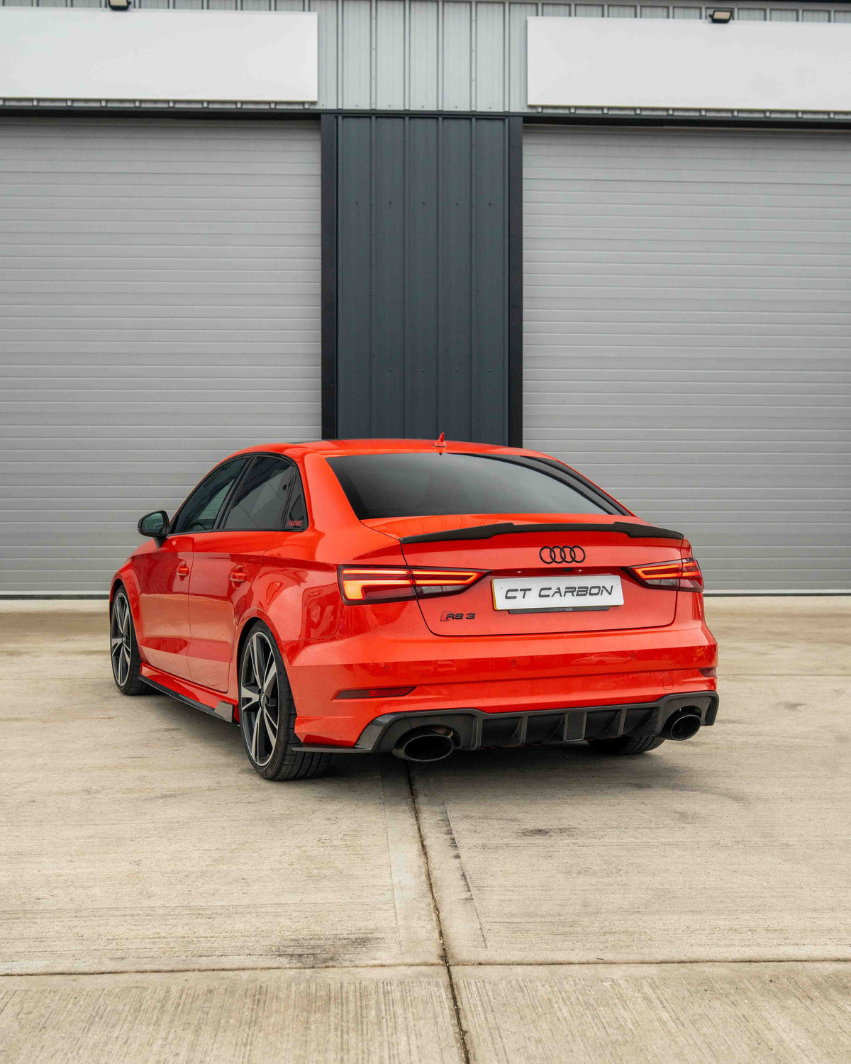 AUDI RS3 8V saloon rear carbon diffuser with DTM light by CT Carbon, showcasing sleek aerodynamic design and high-quality materials.