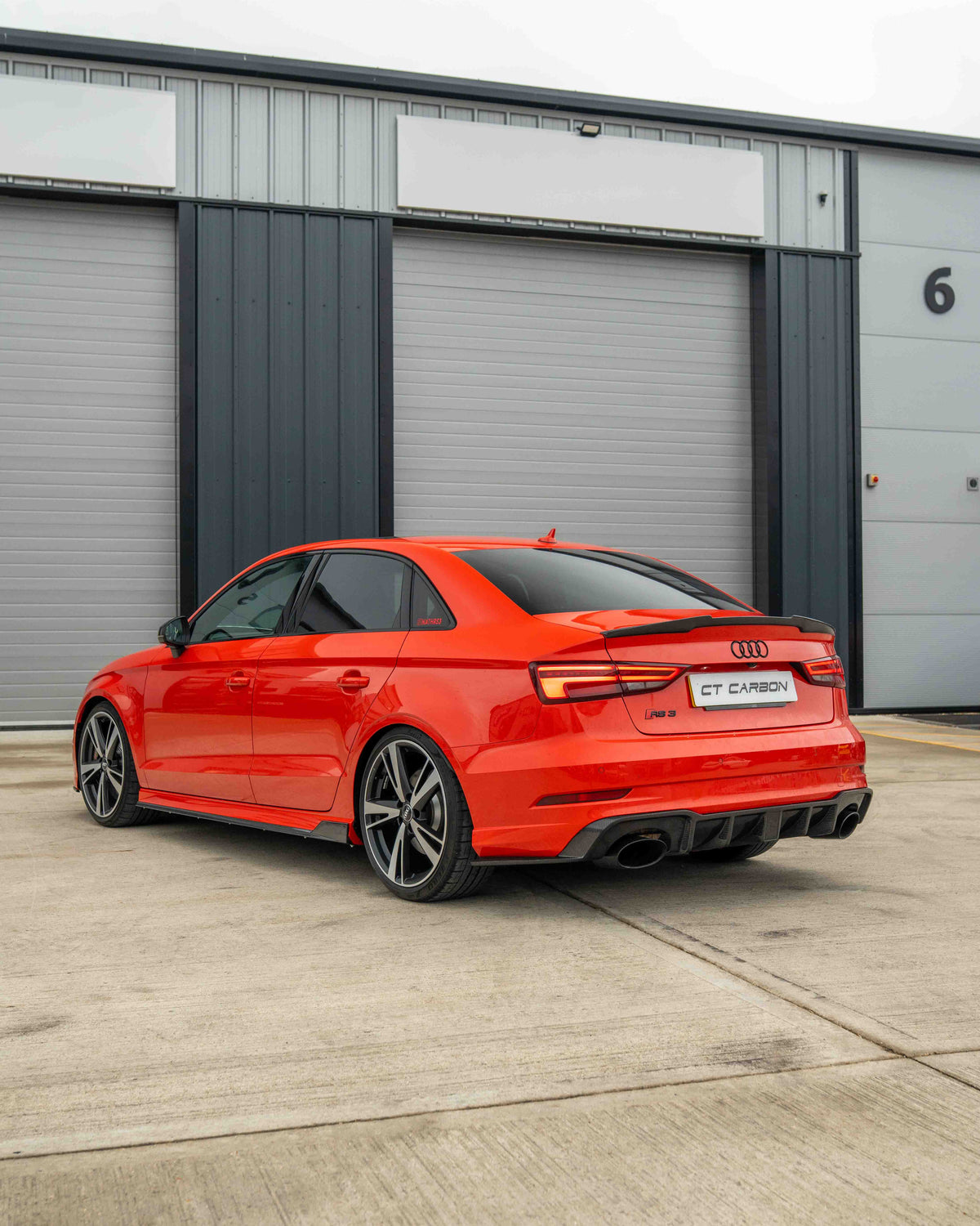 Audi RS3 8V saloon rear carbon diffuser with DTM light by CT Carbon, showcasing sleek aerodynamic design and high-quality materials.