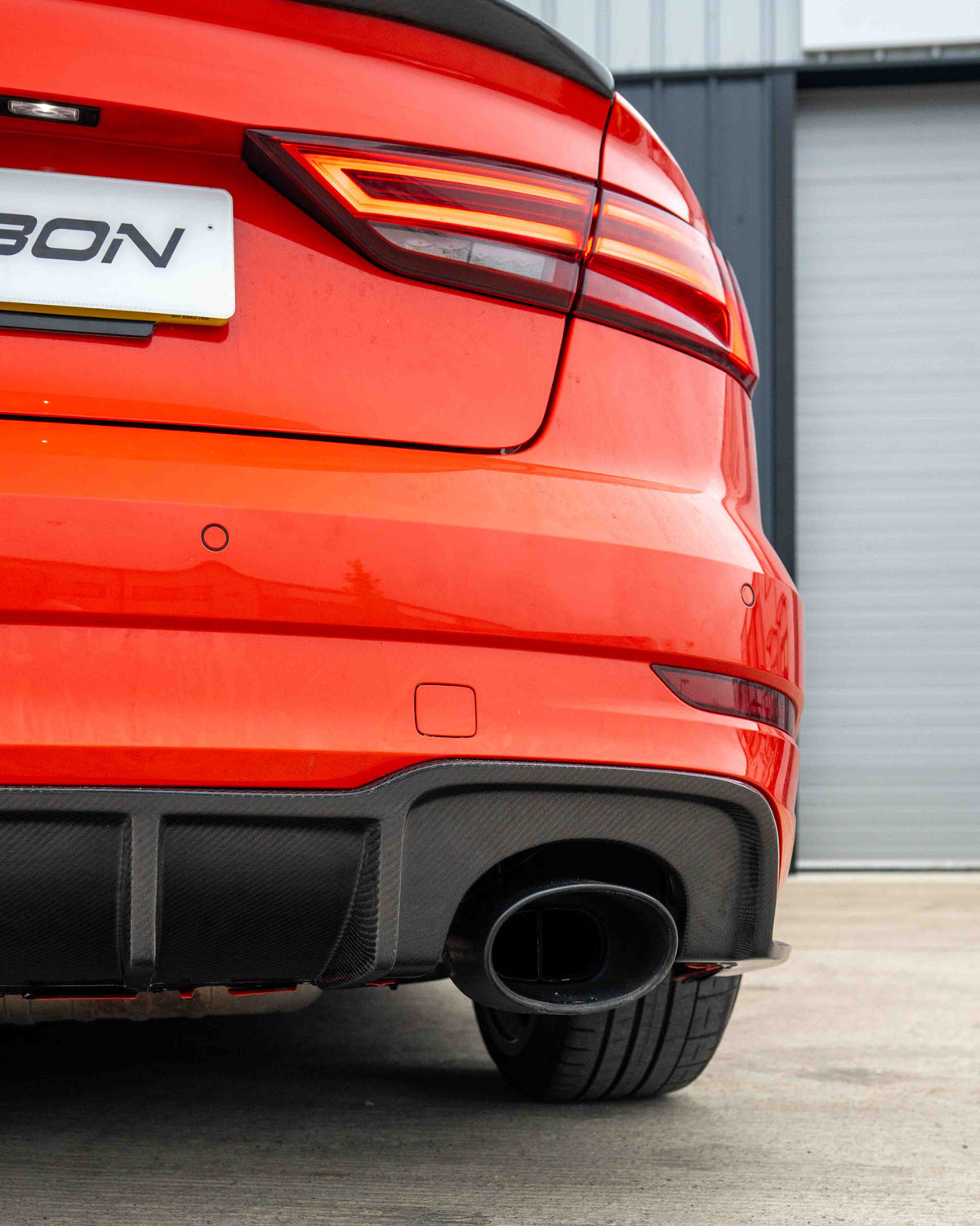 CT Carbon Audi RS3 8V saloon rear carbon diffuser with DTM light, showcasing sleek design and aerodynamic features
