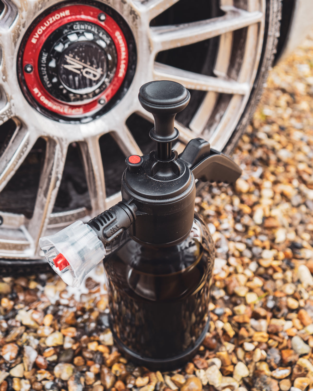 Nineteen72 Performance 72Detailing foaming pressure sprayer with a white container and black handle for car cleaning.