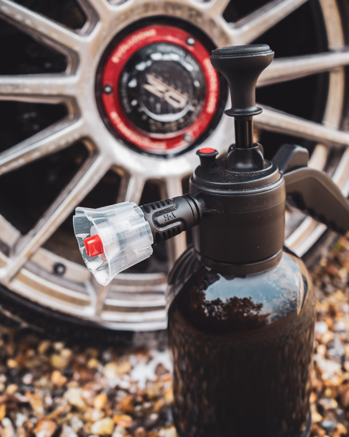 Nineteen72 Performance 72Detailing foaming pressure sprayer with white plastic body and green handle, used for car detailing and cleaning.