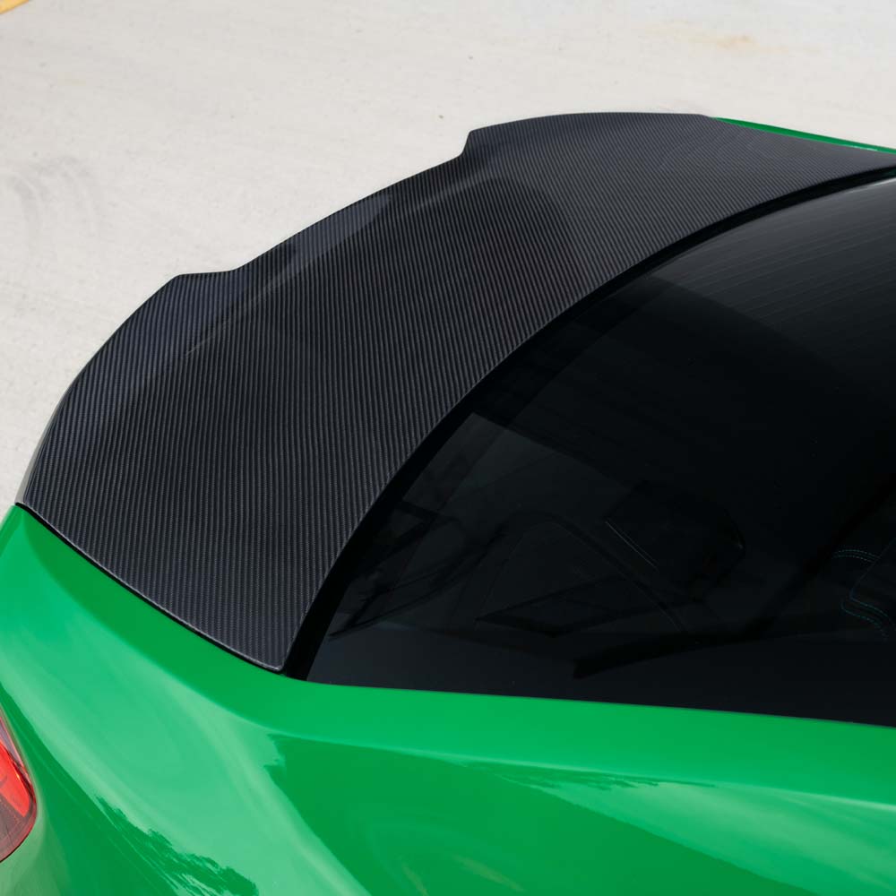 BMW F87 M2 carbon fibre full car kit by CT Carbon, featuring lightweight aerodynamic components and a sleek carbon finish.