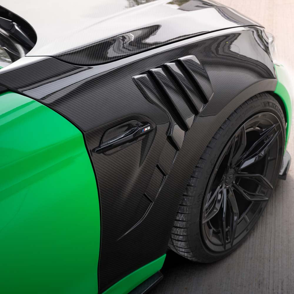 BMW F87 M2 M2C CT Carbon full carbon fibre kit, showing close-up of carbon fiber components and sleek finish.