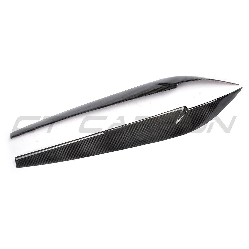 Carbon fiber headlight eyebrows for BMW F15 F16 X5 X6 2014-2018 from CT Carbon, accessory enhances vehicle's front appearance.
