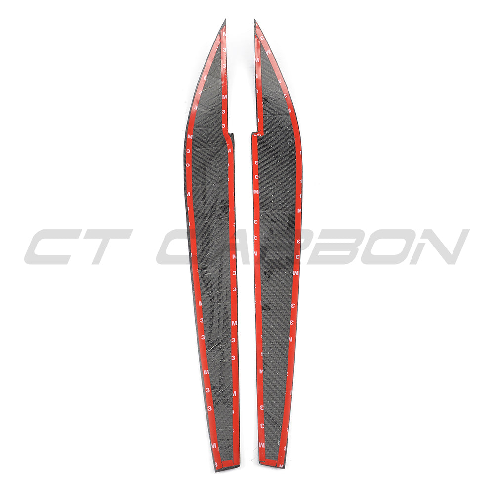 BMW F15 F16 X5 X6 2014-2018 carbon fiber headlight eyebrows accessory by CT Carbon, shown installed on vehicle.