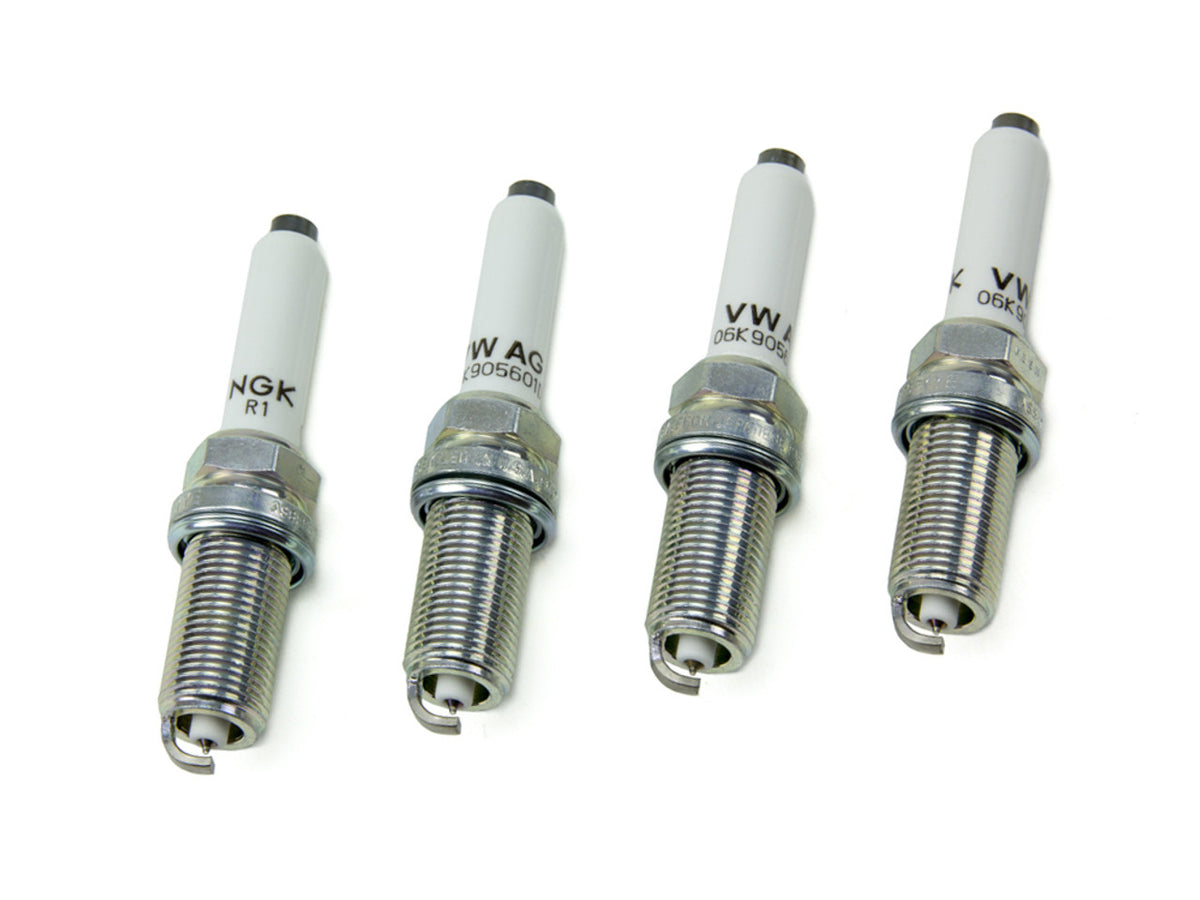 Genuine VWAG spark plug set for 1.8TSI and 2.0TSI EA888 Gen3 engines, showing four high-quality ignition plugs.