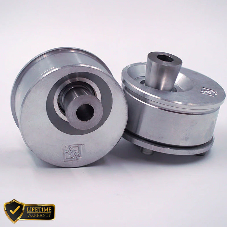 Suspension Secrets front offset caster bushes for BMW F80 M3 and F82 M4 suspension linkages, installed on the vehicle.