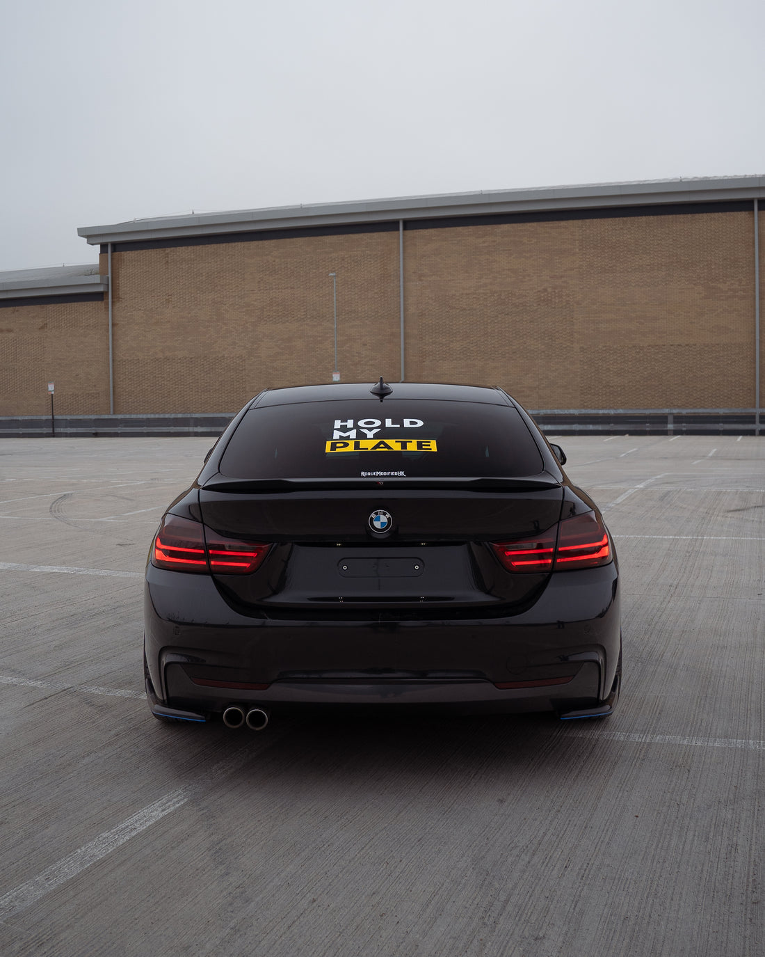 Hold My Plate front bumper magnetic number plate holder attached to a vehicle with a sleek, easy-to-install design.