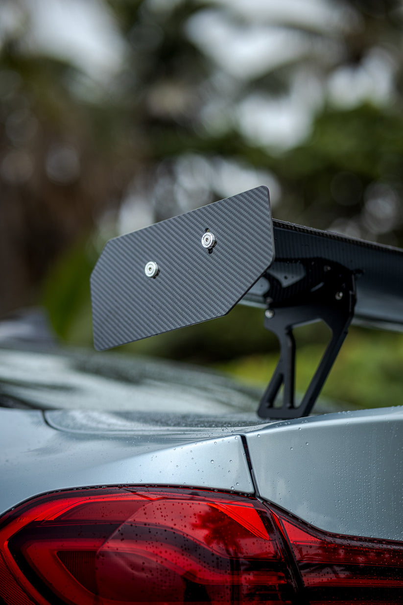Ridgeline Motorsport Wing V2 spoiler made of dry carbon fiber with autoclaved pre-preg construction, designed for performance cars.