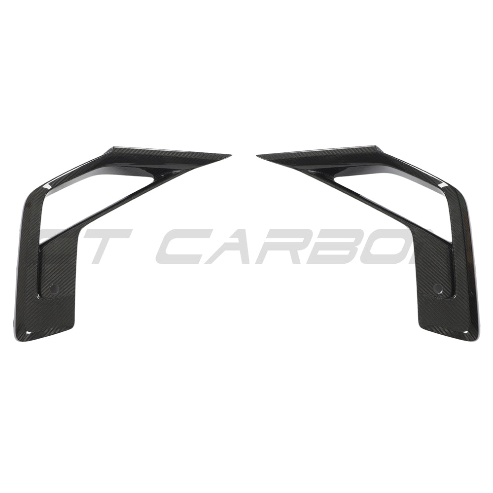 BMW X3M/X4M F97/F98 LCI 2022+ carbon fibre front bumper trim accessory by CT Carbon, showing close-up of textured carbon fiber surface.