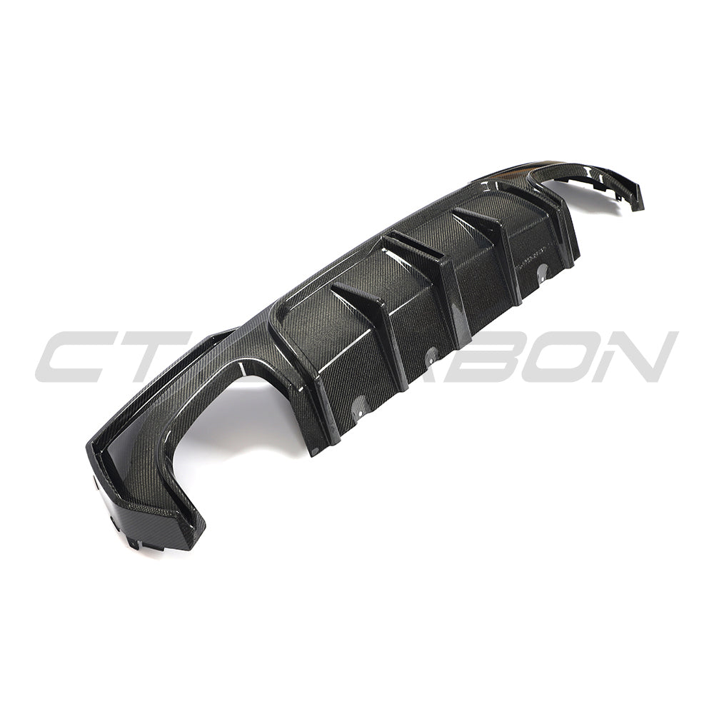 BMW G22 4 Series 2020+ carbon fibre kit by CT Carbon, showing close-up of carbon fibre accents and kit components.