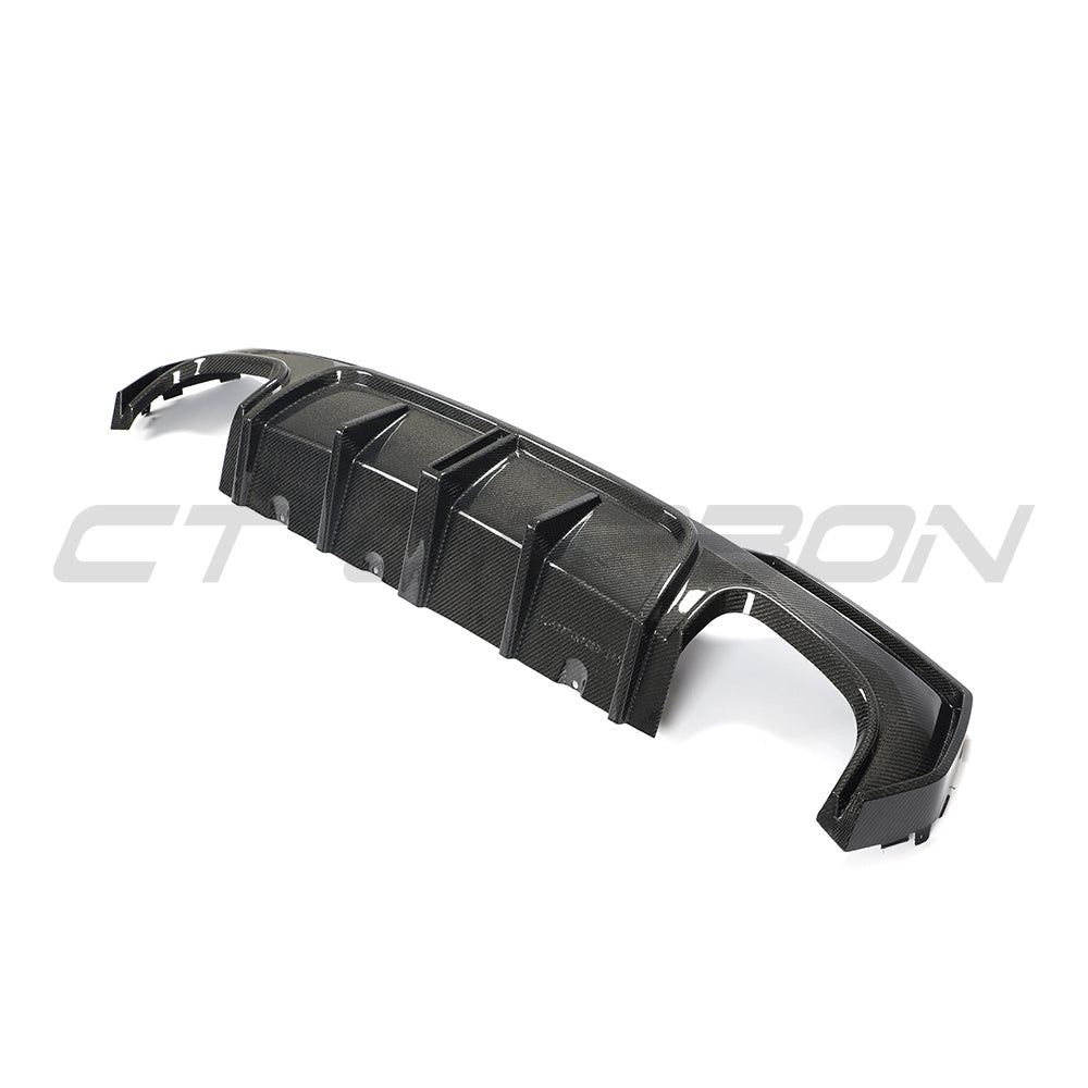 BMW G22 4 Series 2020+ CT Carbon V6 kit with carbon fiber components, shown on a sleek, sporty car exterior.
