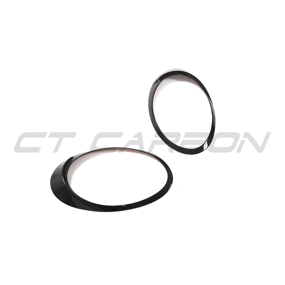 Carbon fibre headlight eyebrows for Porsche 991 911 (2012-2021) by CT Carbon, enhancing vehicle's front look.