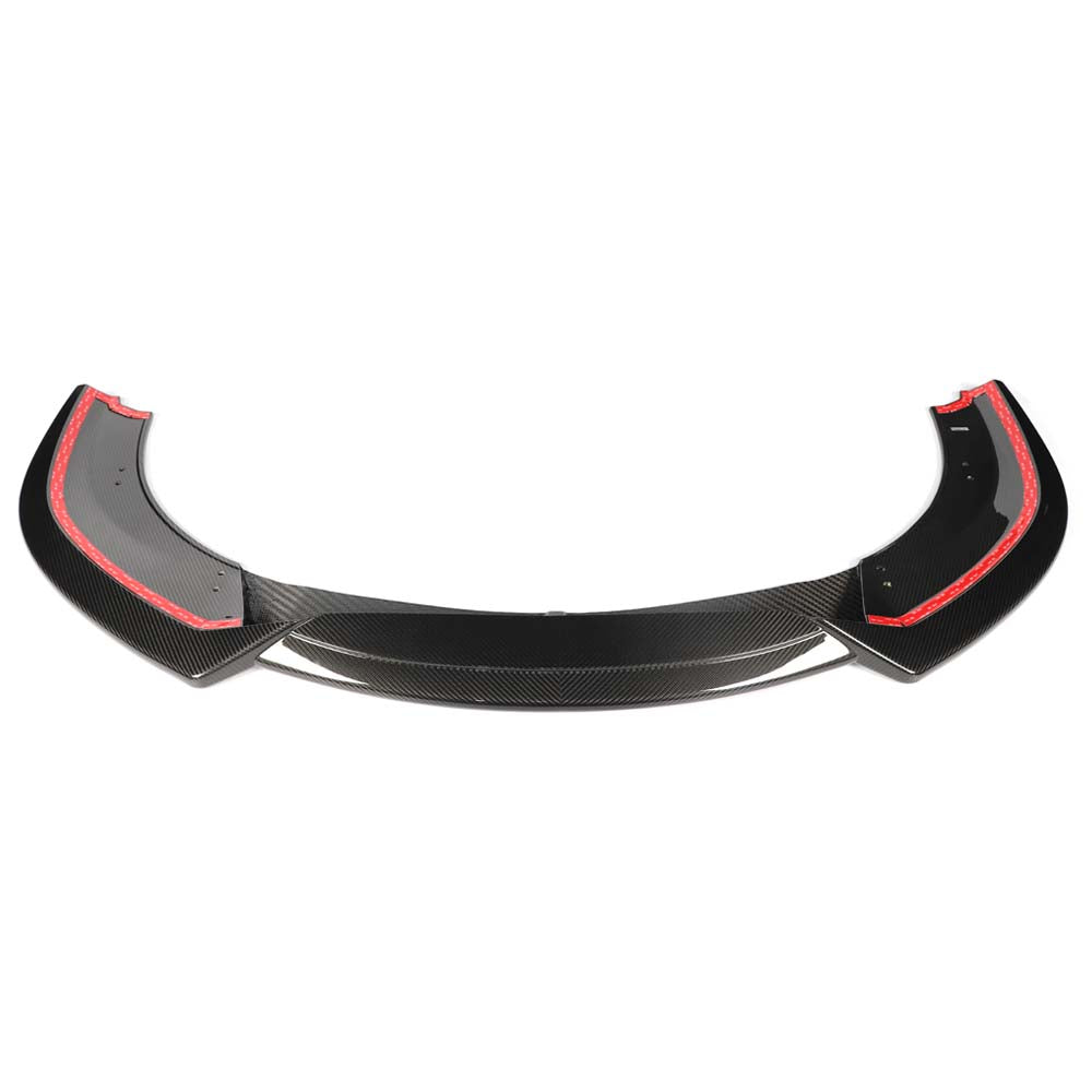 CT Carbon McLaren 750S 2023 carbon fiber splitter installed on the front of the sports car, showcasing sleek, lightweight design.