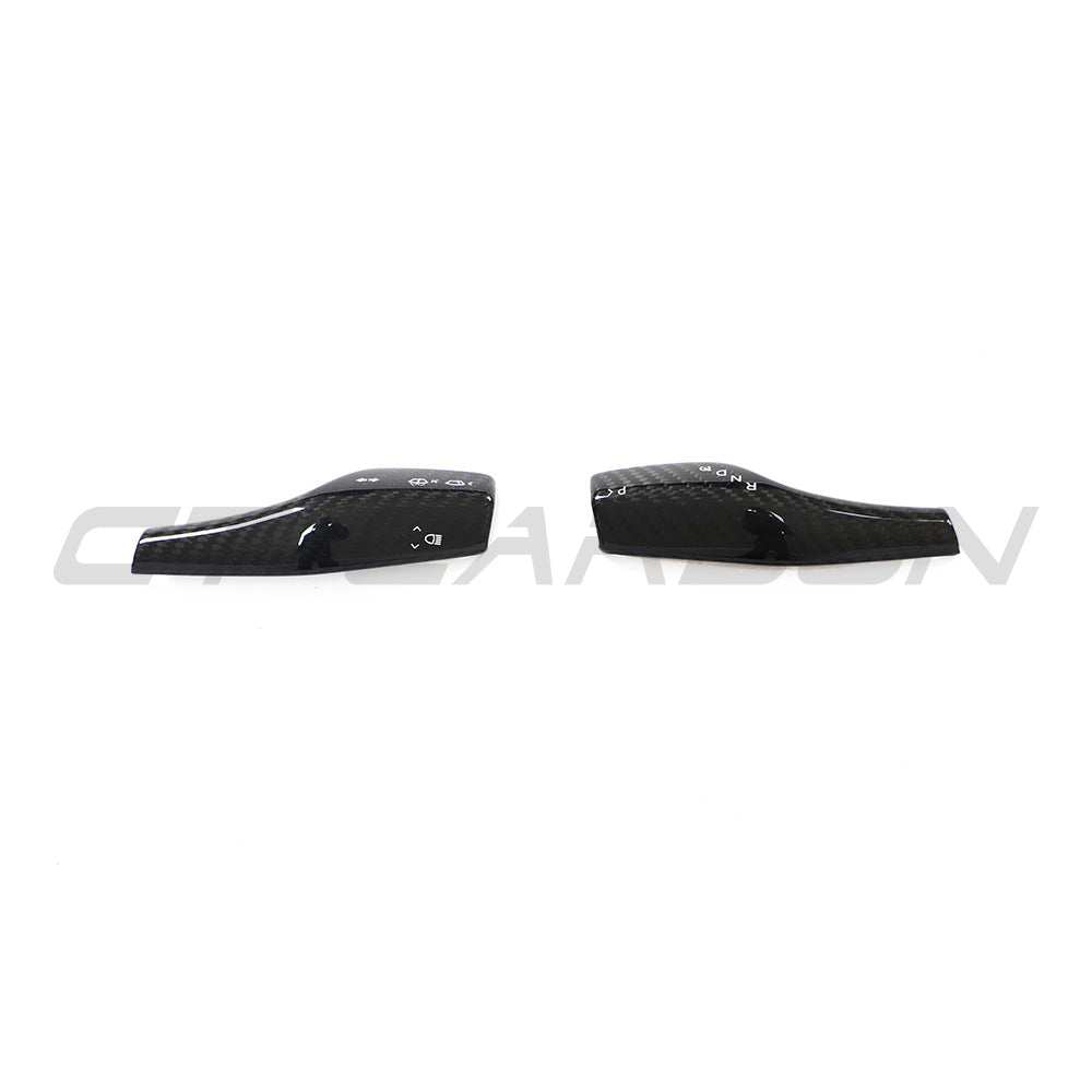 CT Carbon carbon fibre stalk cover for Tesla Model 3 and Y (2017+), close-up of sleek, textured accessory on steering stalk.
