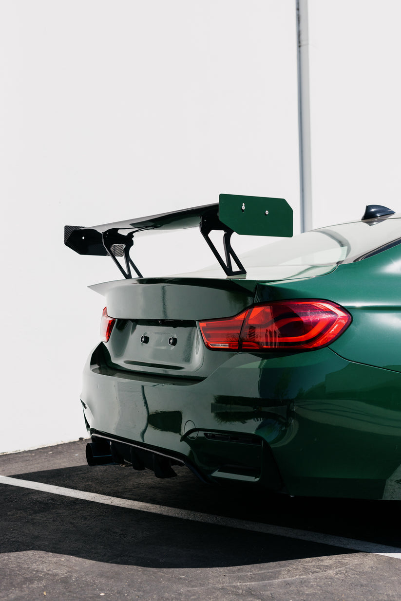 Ridgeline Motorsport Wing V2 spoiler with autoclaved pre-preg dry carbon construction, shown from a side angle.