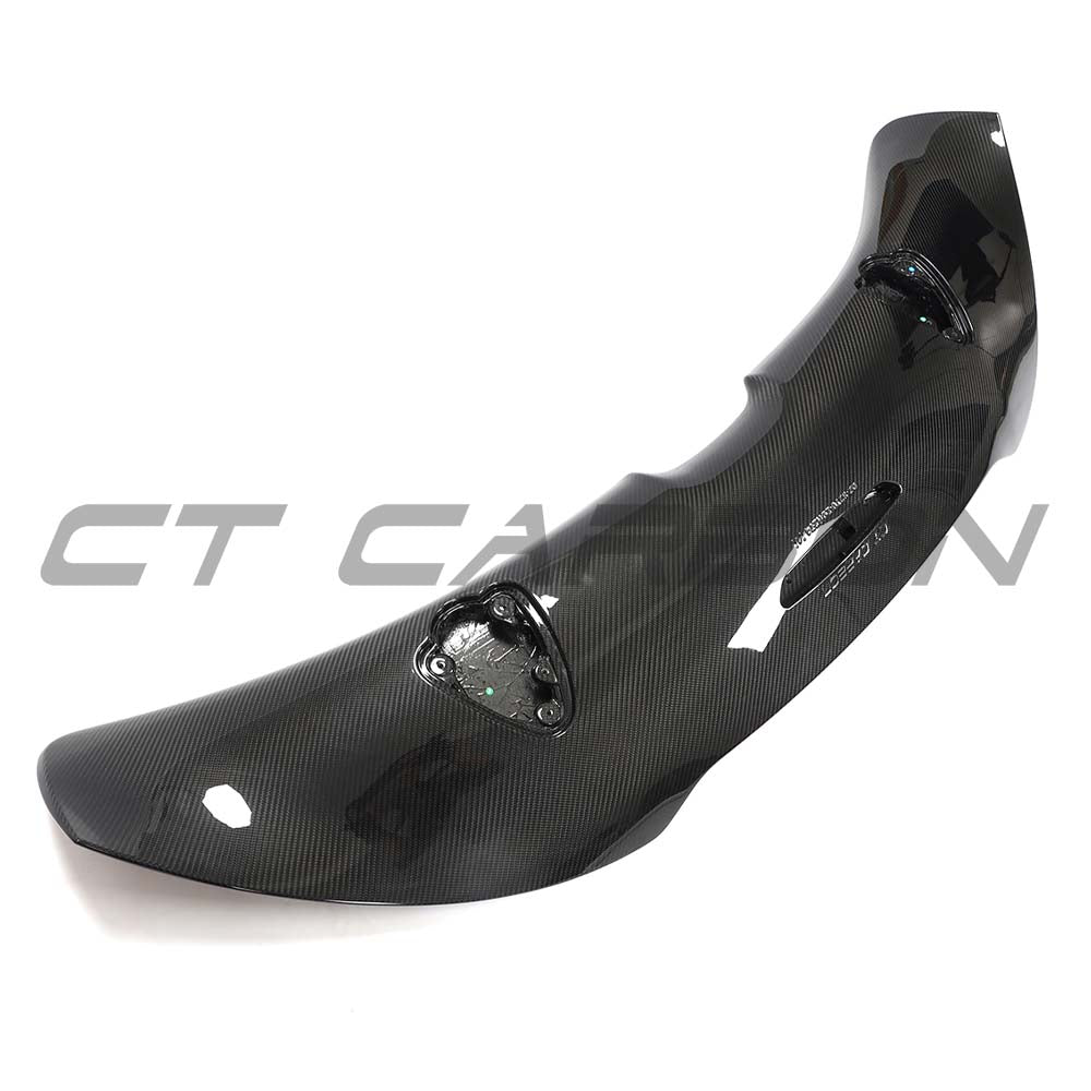 Carbon fiber kit for McLaren 720S by CT Carbon, showcasing full carbon fiber components on the car.