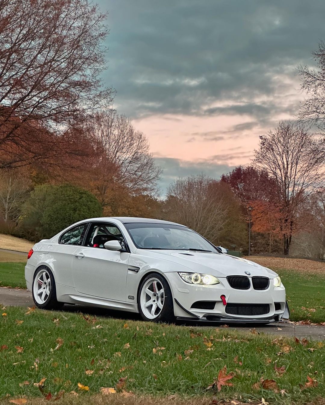 Ridgeline Motorsport E9X M3 GT4 V1 front splitter spoiler mounted on a car for enhanced aerodynamics.