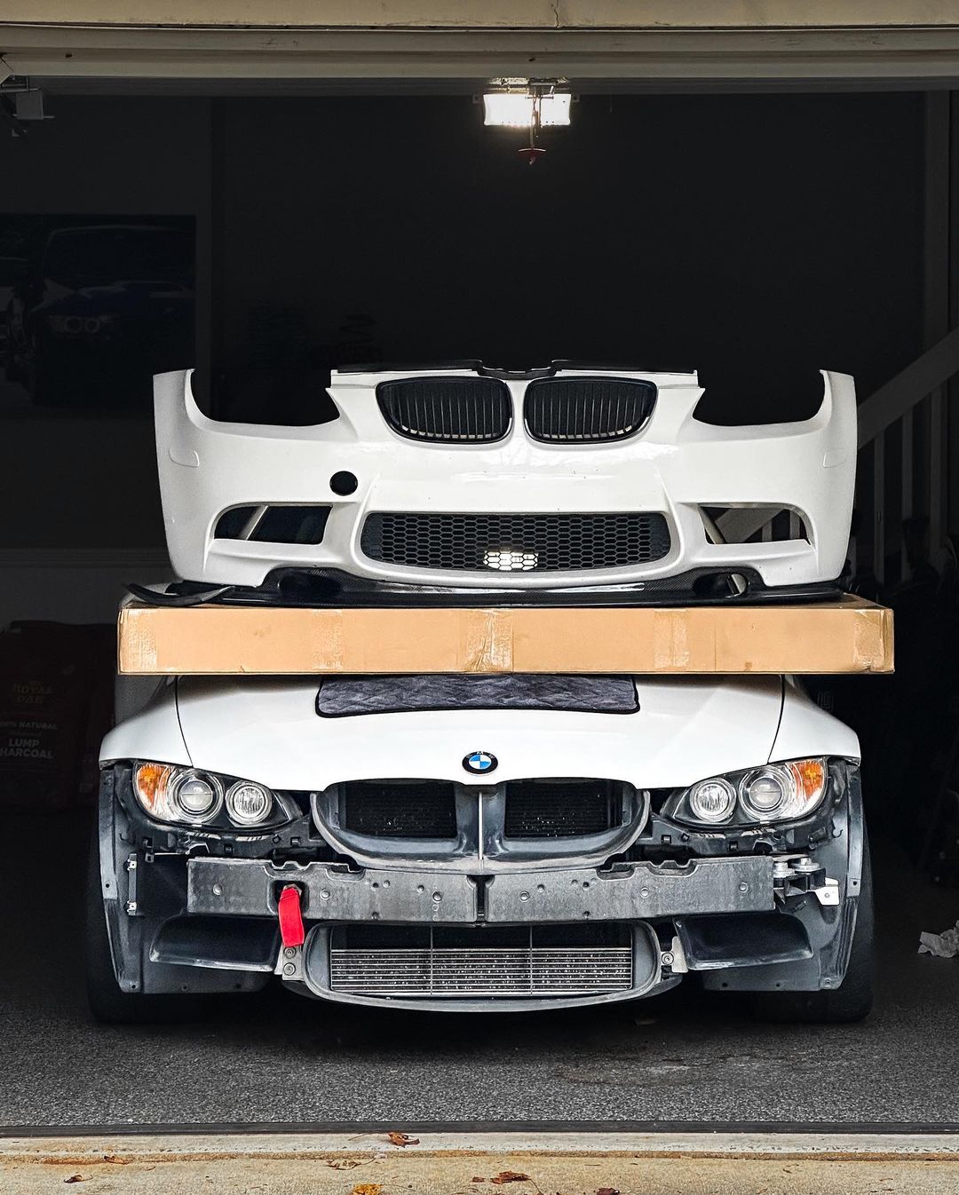 Ridgeline Motorsport E9X M3 GT4 V1 front splitter spoiler for E36 M3, showing the aerodynamic design and mounting points.
