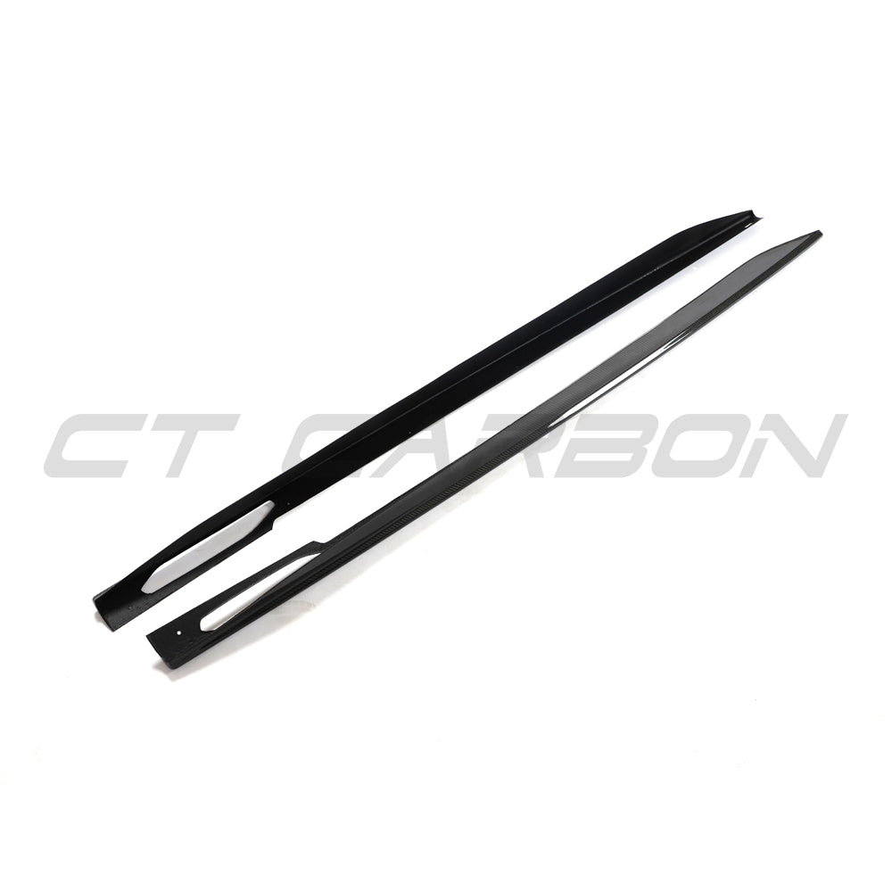 BMW 4 Series G26 and i4 carbon fibre side skirts by CT Carbon, shown installed on the vehicle with a sleek finish.