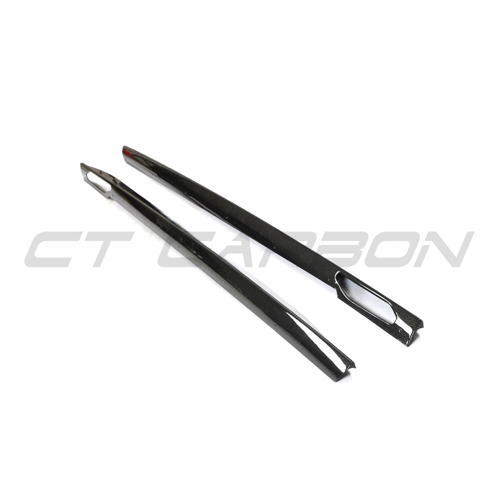 BMW 4 Series G26 and i4 carbon fibre side skirts by CT Carbon, lightweight aerodynamic car accessories, shown on vehicle.